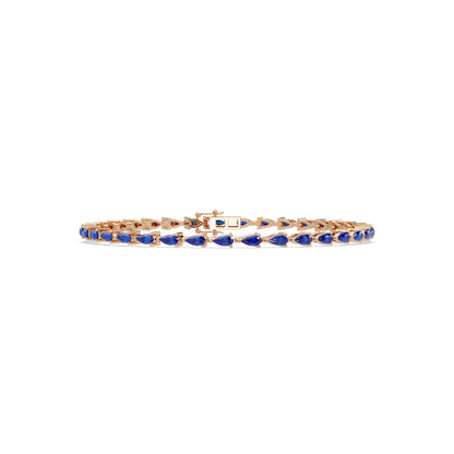 Pear-cut sapphire blue colorstone tennis bracelet in rose gold
