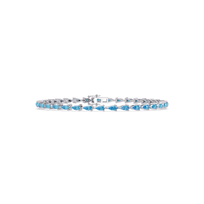 Pear-cut aquamarine blue colorstone tennis bracelet in white gold