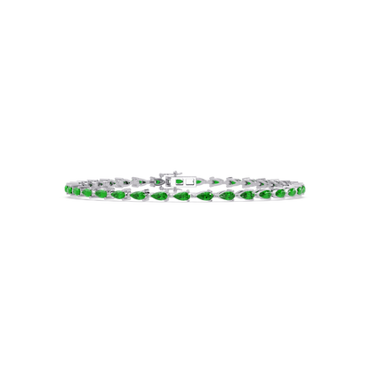 Pear-cut emerald green colorstone tennis bracelet in white gold