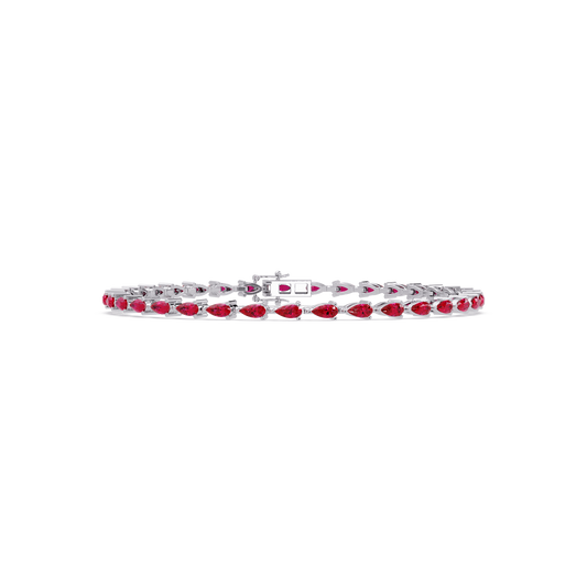Pear-cut ruby red colorstone tennis bracelet in white gold