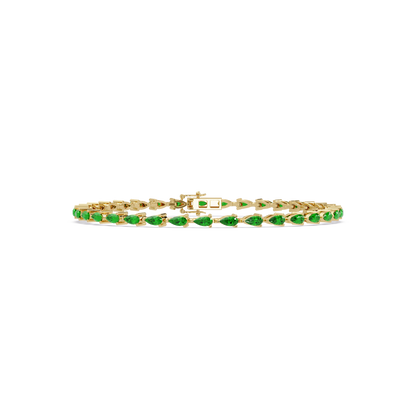 Pear-cut emerald green colorstone tennis bracelet in yellow gold
