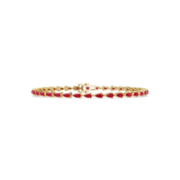 Pear-cut ruby red colorstone tennis bracelet in yellow gold