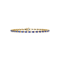 Pear-cut sapphire blue colorstone tennis bracelet in yellow gold