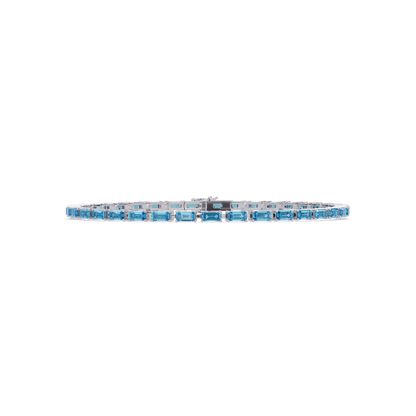 Emerald-cut aquamarine blue colorstone tennis bracelet in white gold