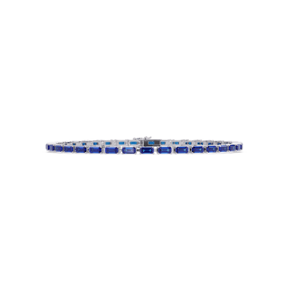 Emerald-cut sapphire blue colorstone tennis bracelet in white gold