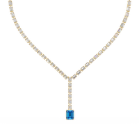 Emerald-cut aquamarine blue colorstone tennis necklace in yellow gold