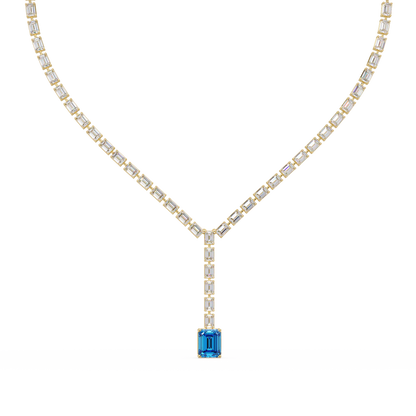 Emerald-cut aquamarine blue colorstone tennis necklace in yellow gold