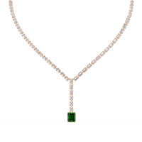 Emerald-cut emerald green colorstone tennis necklace in yellow gold