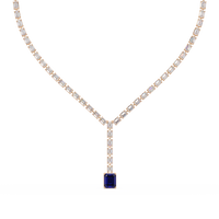 Emerald-cut sapphire blue colorstone tennis necklace in yellow gold