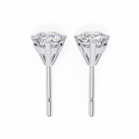 2.57 CTW round lab-grown diamond stud earrings in a three-prong martini setting crafted from 14K gold.