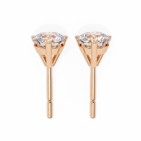 2.57 CTW round lab-grown diamond stud earrings in a three-prong martini setting crafted from polished 14K gold.