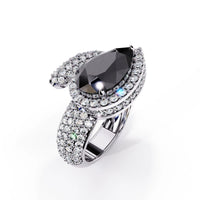 3.0 CTW pear-cut halo pavé bypass colorstone ring product render with round pavé accent stones.