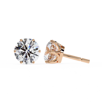 2.57 CTW round lab-grown diamond stud earrings in a six-prong tulip setting crafted from polished 14K rose gold.