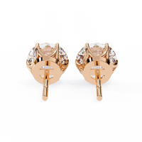 2.57 CTW round lab-grown diamond stud earrings in 14K gold with elegant six-prong tulip settings.