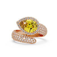 3.0 CTW pear-cut Citrine Yellow halo pavé bypass ring in 14K Rose Gold with round pavé accent stones.