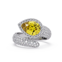 3.0 CTW pear-cut Citrine Yellow halo pavé bypass ring in 14K White Gold with round pavé accent stones.