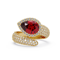 3.0 CTW pear-cut Ruby Red halo pavé bypass ring in 14K Yellow Gold with round pavé accent stones.