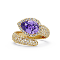 3.0 CTW pear-cut Amethyst Purple halo pavé bypass ring in 14K Yellow Gold with round pavé accent stones.