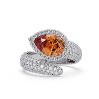 3.0 CTW pear-cut Champagne Topaz halo pavé bypass ring in 14K White Gold with round pavé accent stones.