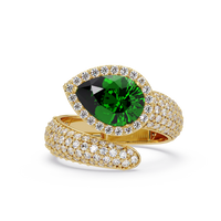 3.0 CTW pear-cut Emerald Green halo pavé bypass ring in 14K Yellow Gold with round pavé accent stones.