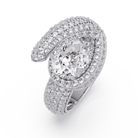 3.0 CTW pear-cut halo pavé bypass colorstone ring detail view with a pear center and round pavé accents.