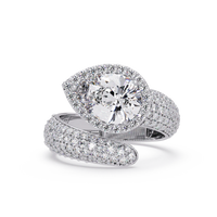3.0 CTW pear-cut halo pavé bypass colorstone ring detail view with a pear center and round pavé accents.