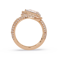 3.0 CTW pear-cut halo pavé bypass colorstone ring detail view with a pear center and round pavé accents.